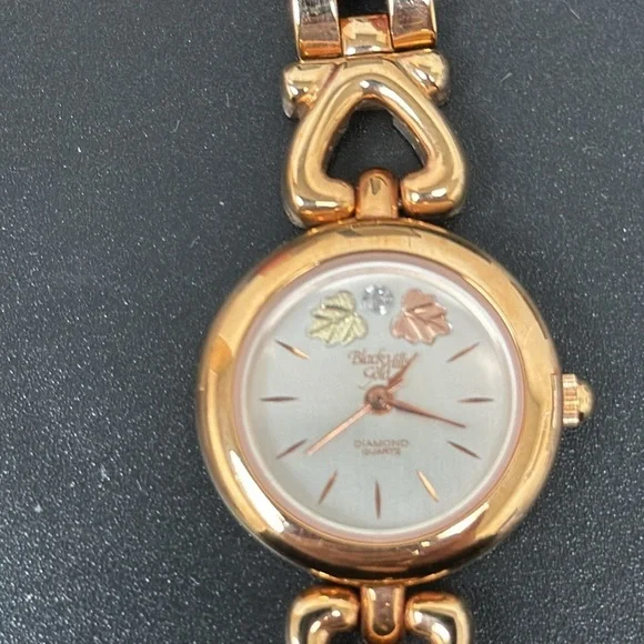 EUC Black Hills Gold women’s Watch with genuine diamonds d & reversible band